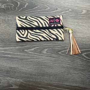 NWOT mini size makeup junkie bag